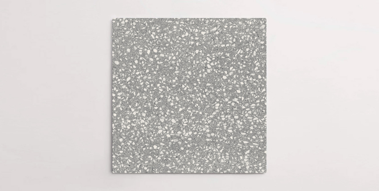 Nasco Stone + Tile's Blake Dark Grey Medium Chip terrazzo-look porcelain tile.