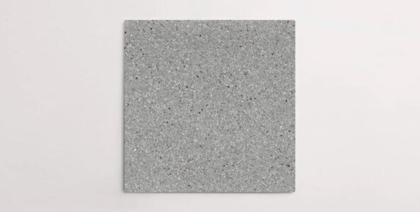 Nasco Stone + Tile's Blake Dark Grey Small Chip terrazzo-look porcelain tile.