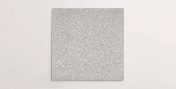 Nasco Stone + Tile's Blake Light Grey Small Chip terrazzo-look porcelain tile.