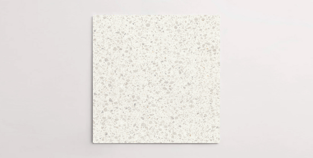 Nasco Stone + Tile's Blake White Medium Chip terrazzo-look porcelain tile.