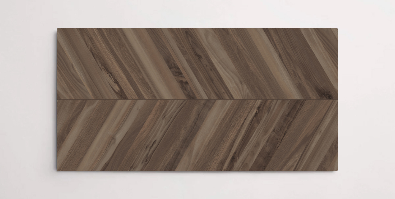 Nasco Stone + Tile Florence Chocolat Chevron 24" x 48" wood-look porcelain tile.