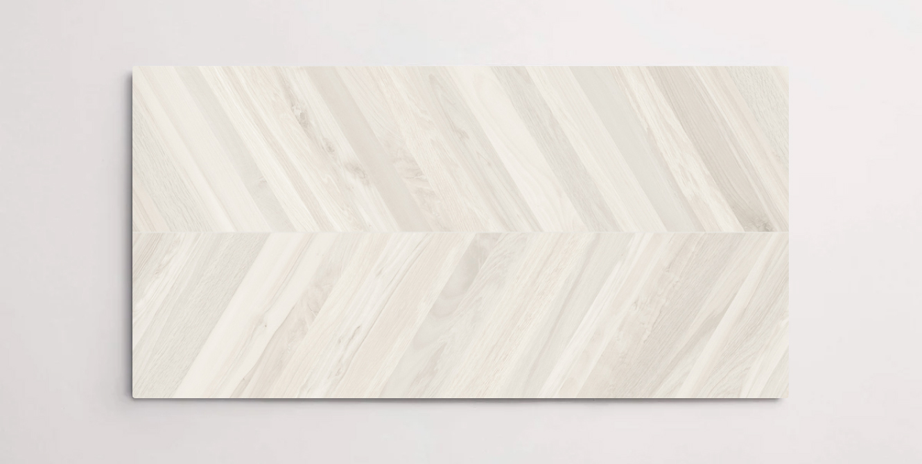 Nasco Stone + Tile Florence Glace Chevron 24" x 48" wood-look porcelain tile.