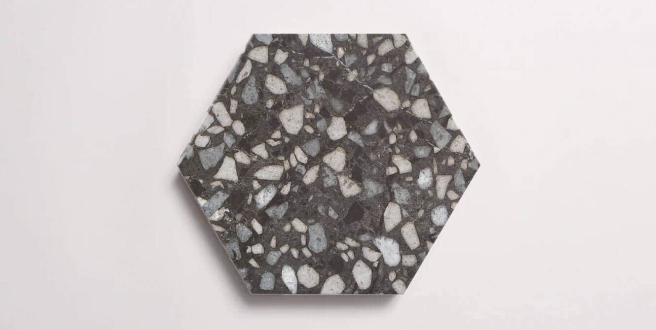 Nasco Stone + Tile Tex Black hexagon porcelain tile.