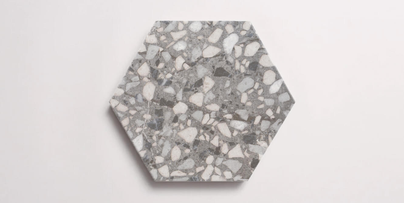 Nasco Stone + Tile Tex Grey hexagon porcelain tile.