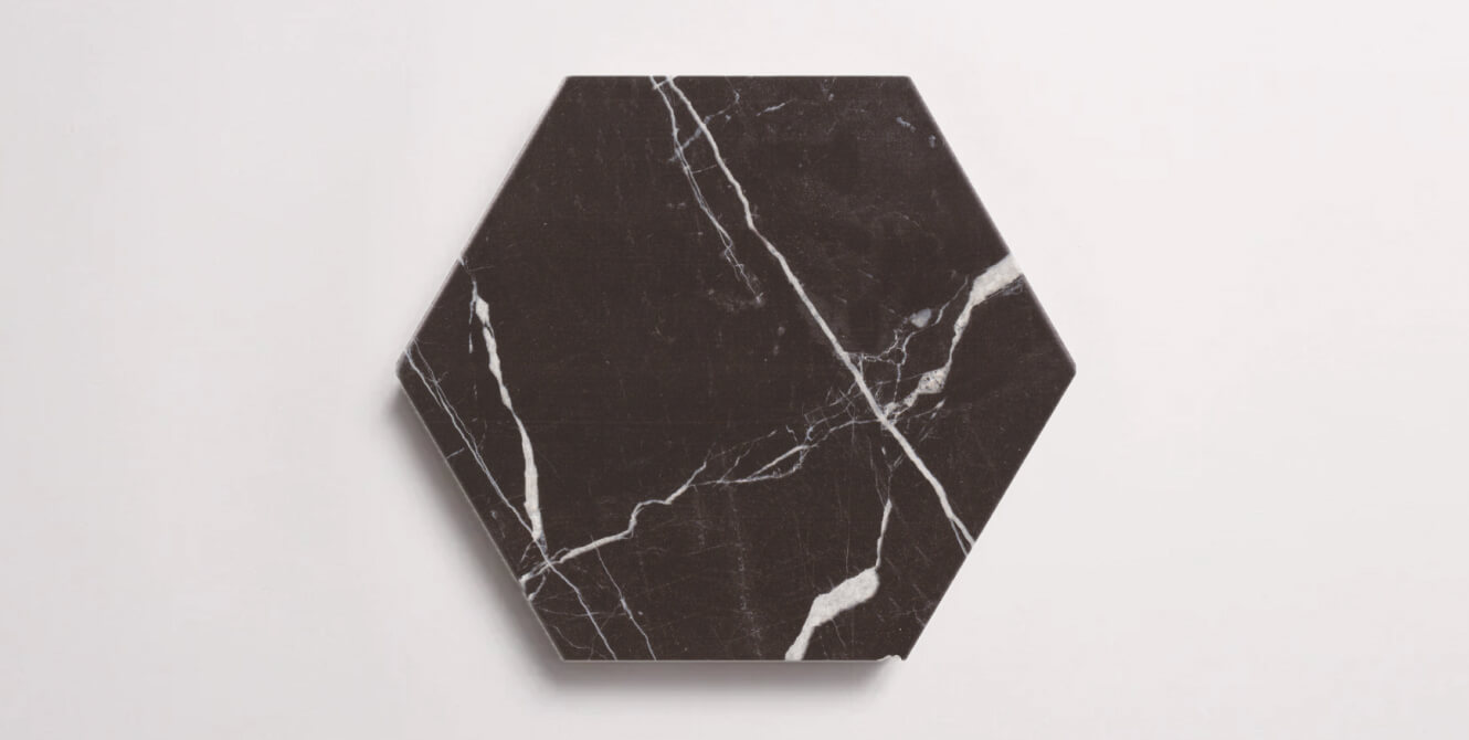 Nasco Stone + Tile Tex Marquina hexagon porcelain tile.