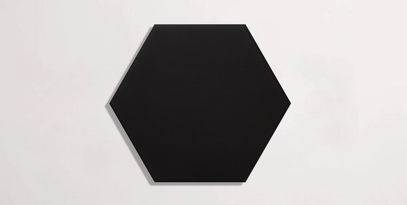 Nasco Stone + Tile Unicolor Extreme Black hexagon porcelain tile.