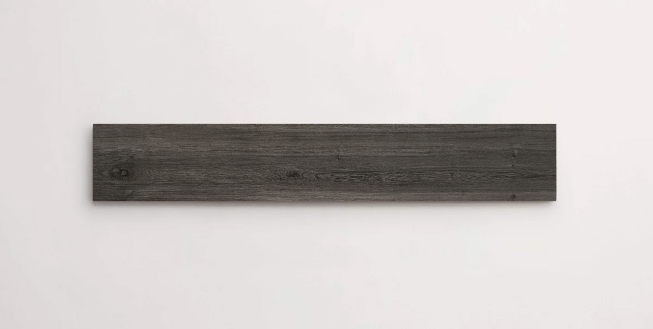 Nasco Stone + Tile Lift Dark Grey 8" x 36" wood-look porcelain tile.