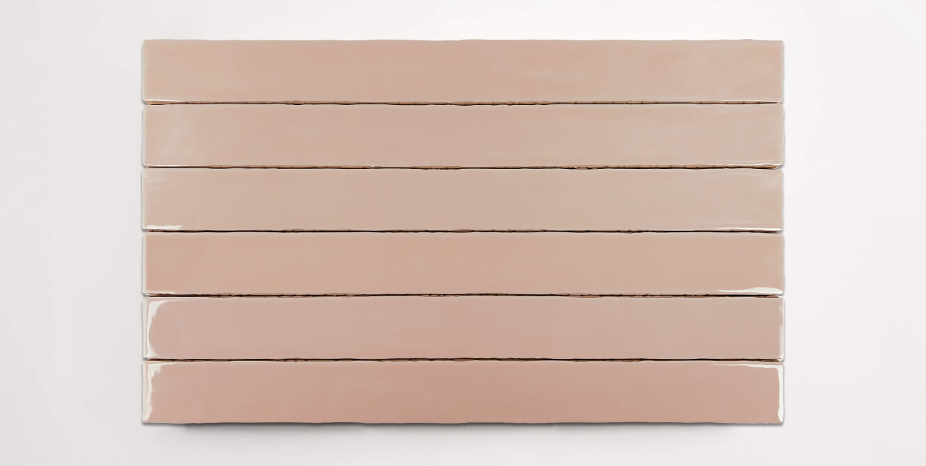 Six stacked 2" x 20" ceramic tiles in a light pink color