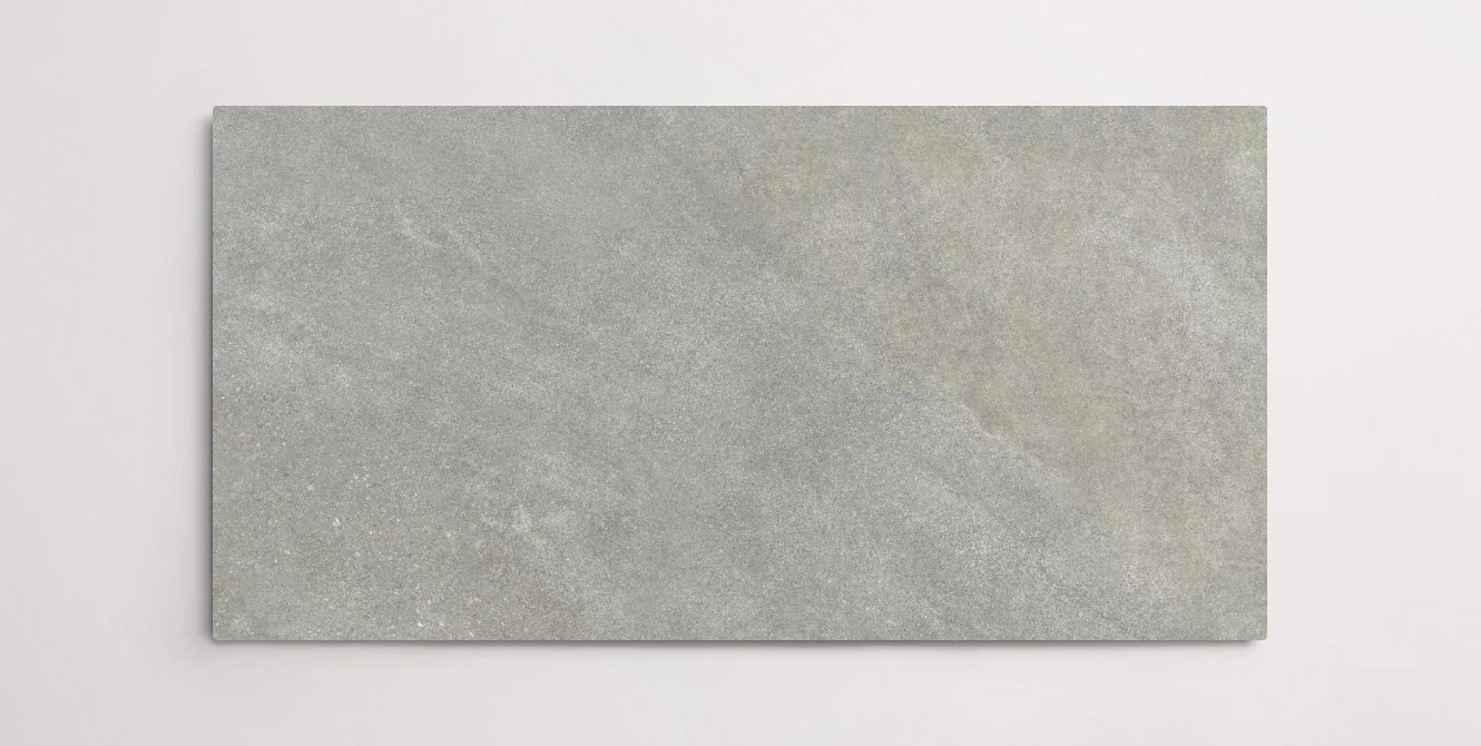 Nasco Stone + Tile Typhoon Light Grey 12" x 24" porcelain tile.