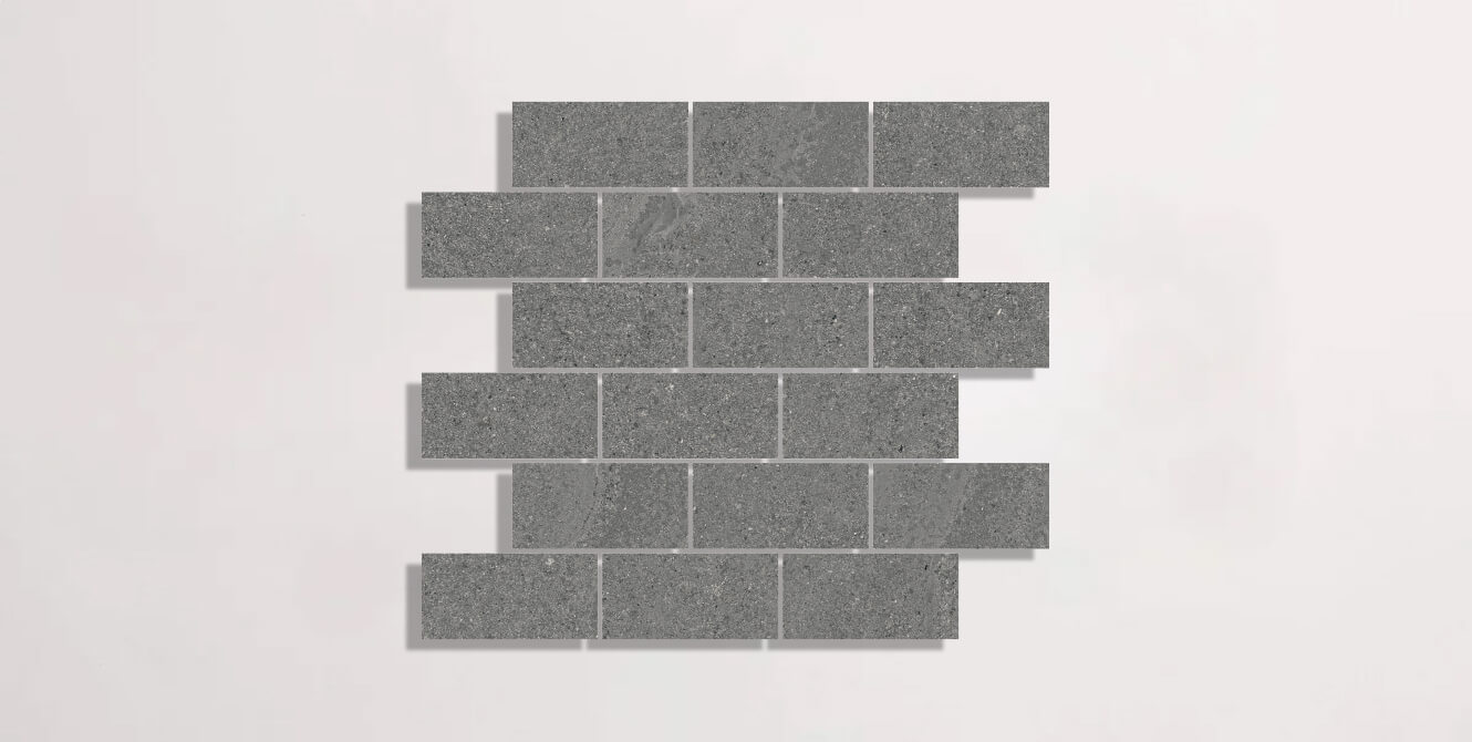 Nasco Stone + Tile Newen Anthracite Brick Mosaic porcelain tile.