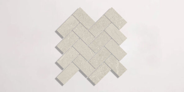 Nasco Stone + Tile Newen Ivory Herringbone Mosaic porcelain tile.