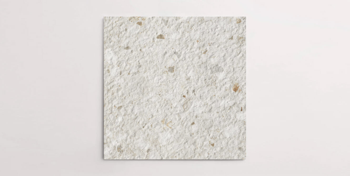 Nasco Stone + Tile's Forage Bianco 24" x 24" terrazzo-look 2CM porcelain paver.